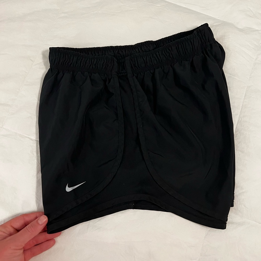 Black Nike running shorts